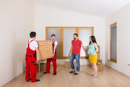 Removal team helping with a residential move near Ravenscourt Park