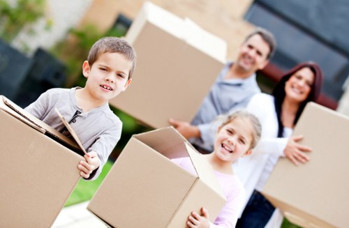 Packed boxes and furniture ready for removal truck hire