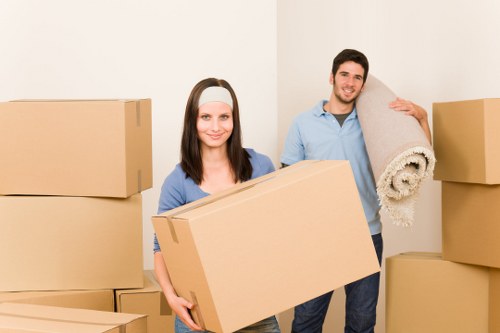 Loading furniture into a moving truck in west London