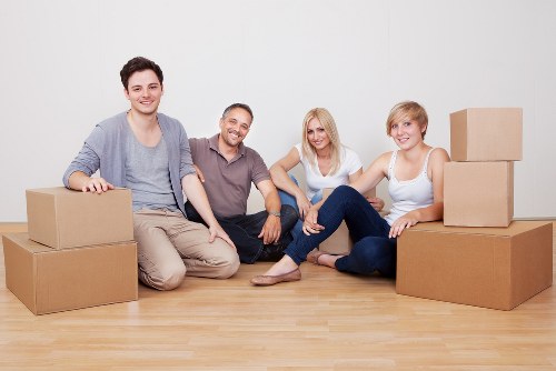 Office desks and boxes being organised for commercial relocation