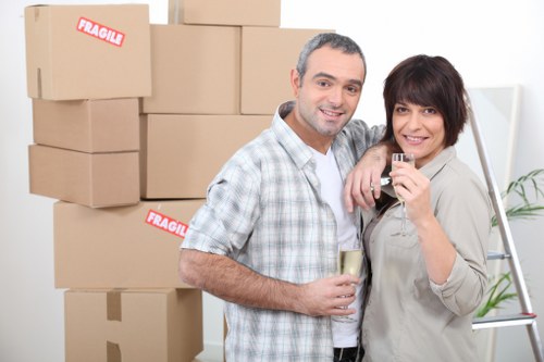 Furniture and boxes being prepared for a flat move near Ravenscourt Park